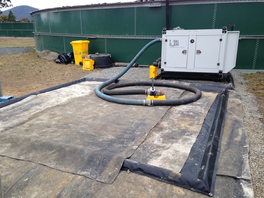 Spill bund used as hose laydown for fracking operation XR-5 Spill bund used as hose laydown for fracking operation